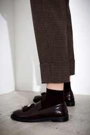 Pantalone con risvolto pied de poule