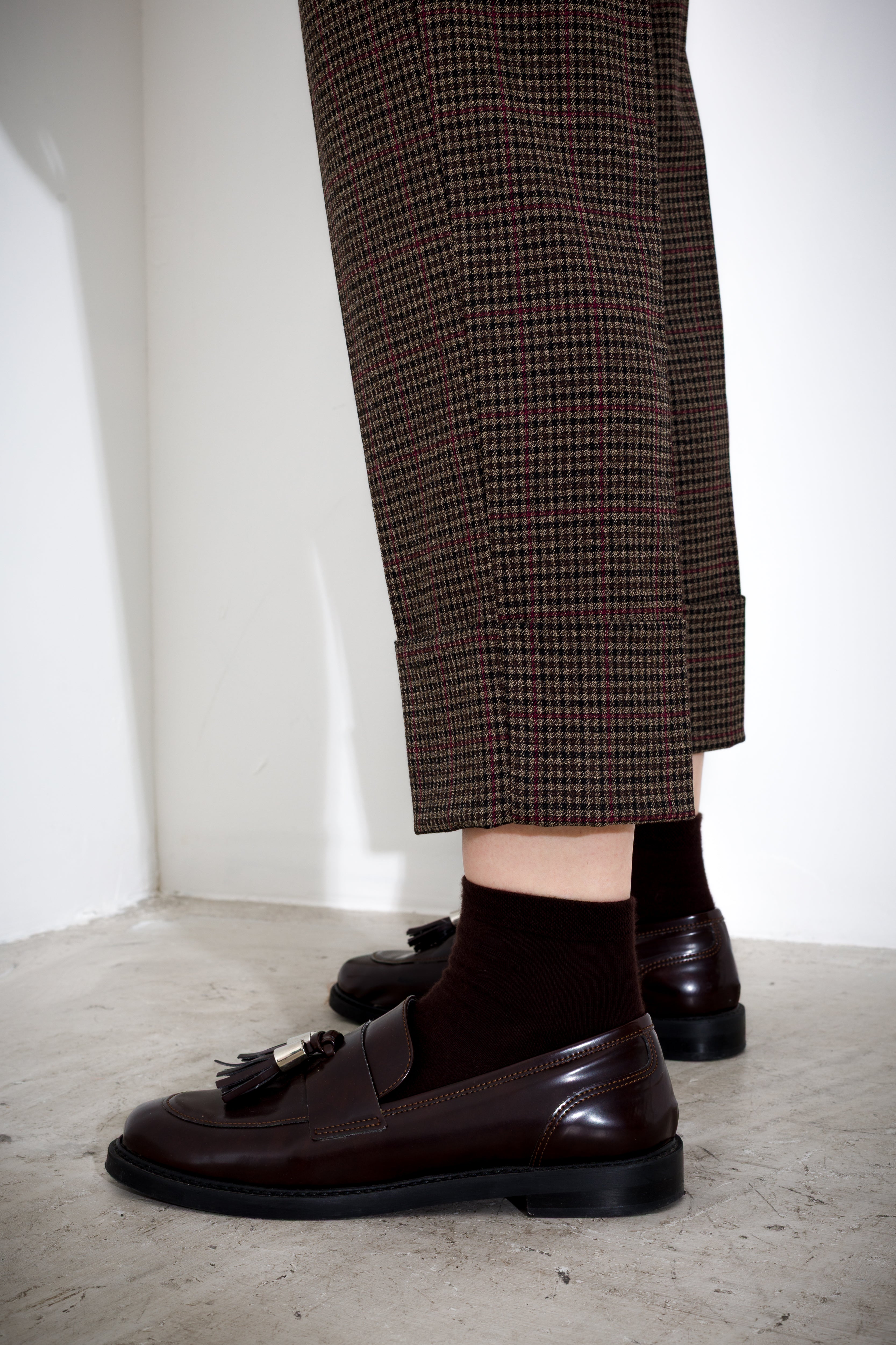 Pantalone con risvolto pied de poule