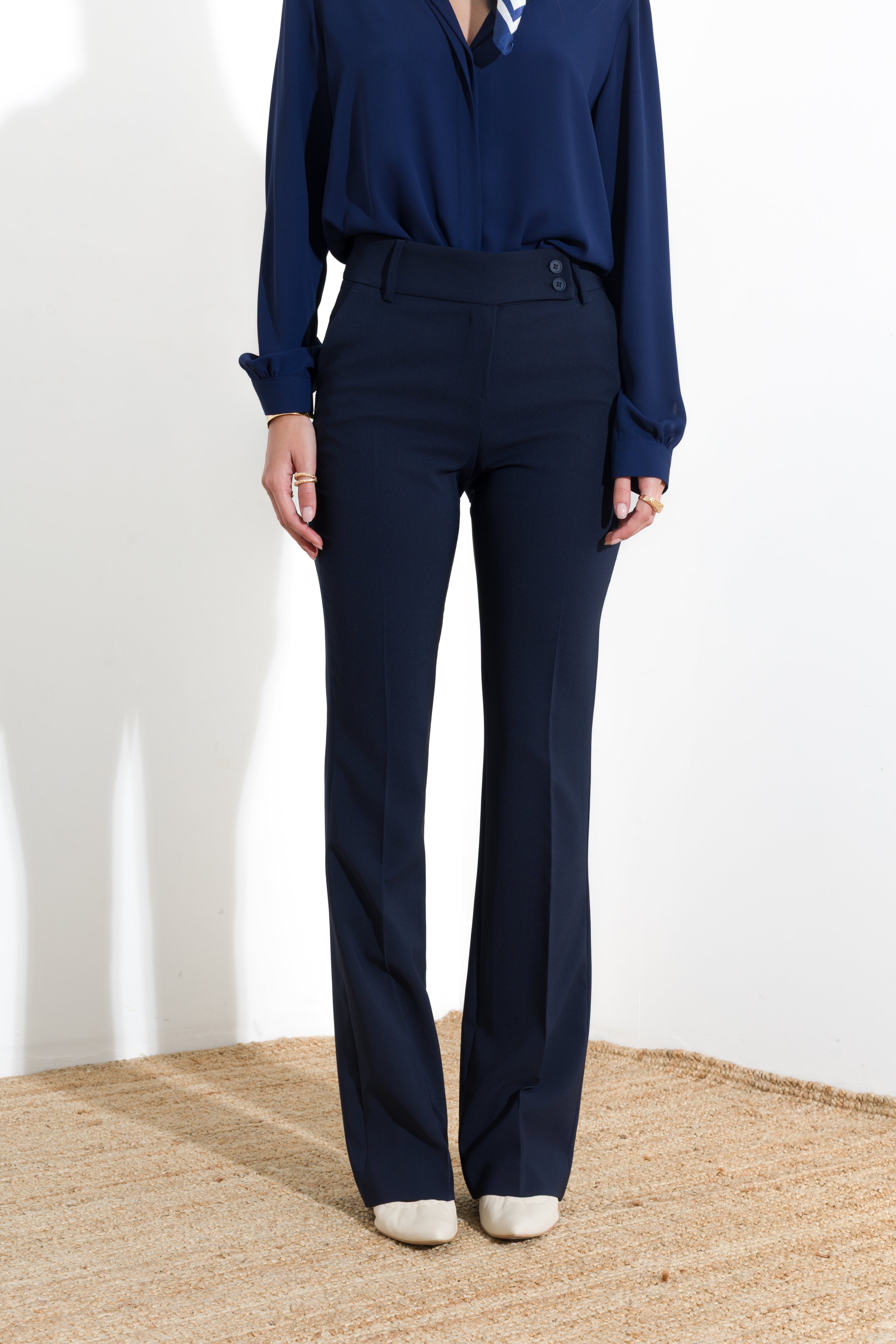 Technical flared trousers