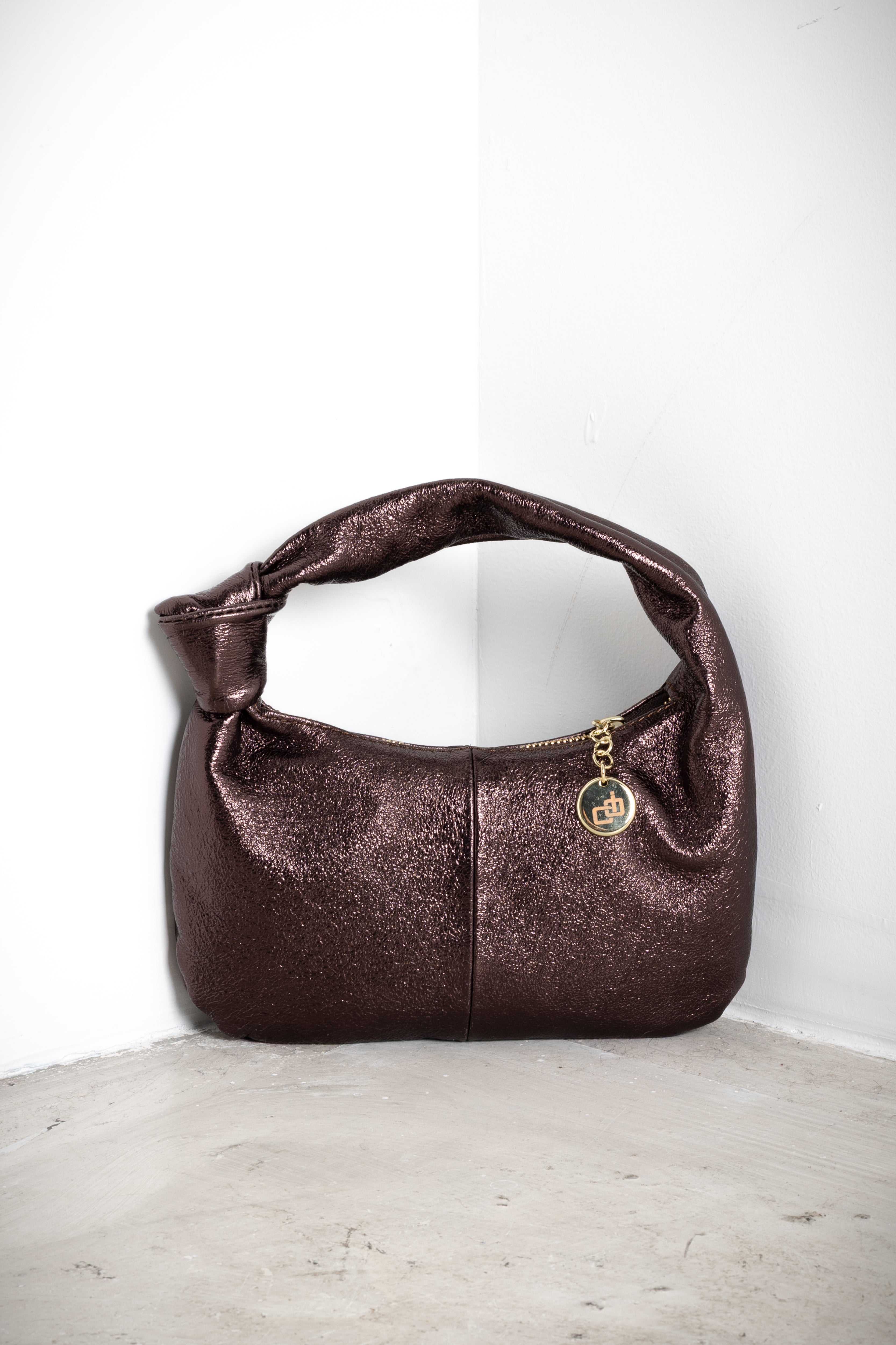 Borsa mini in pelle laminata