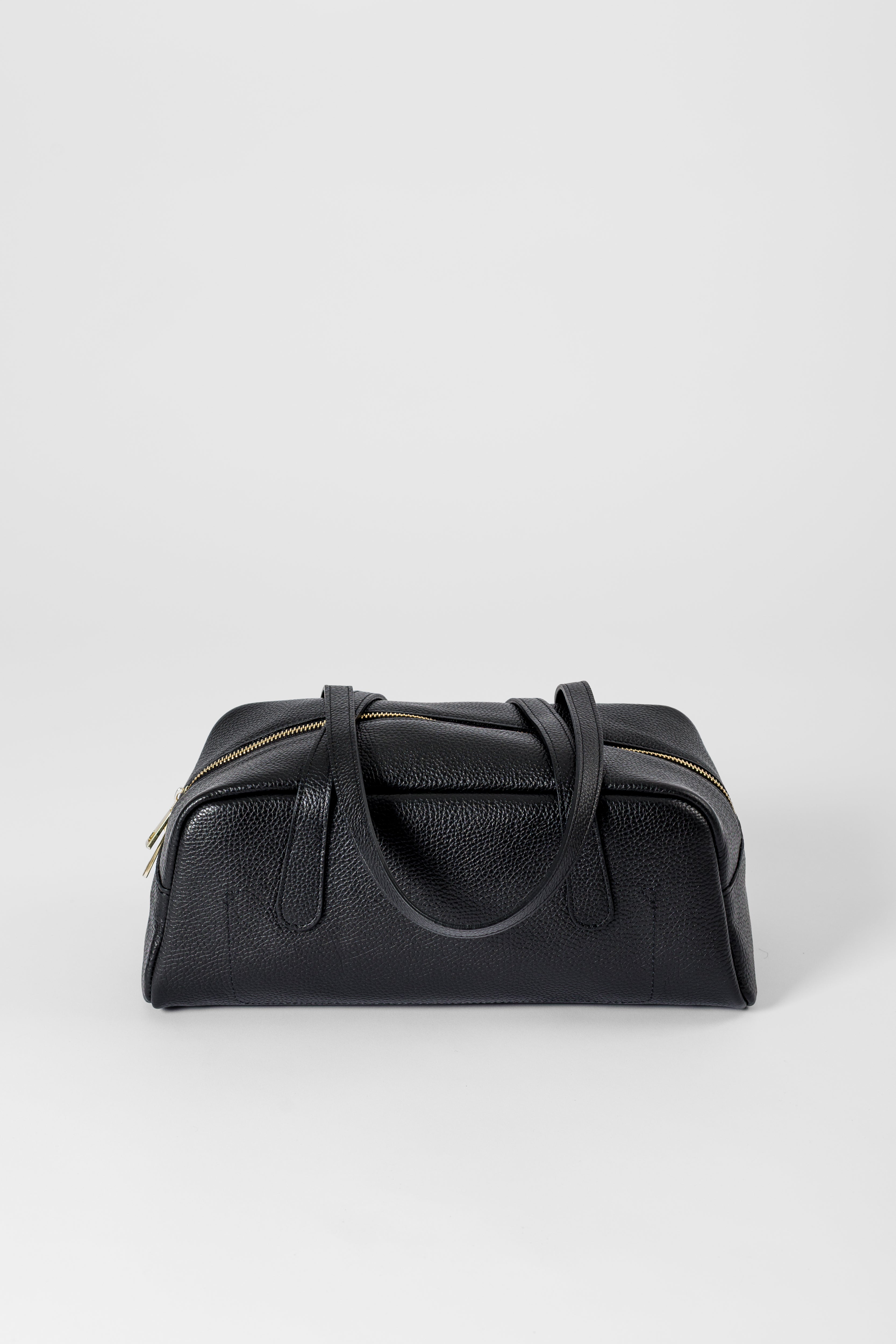 Bowling bag in pelle martellata
