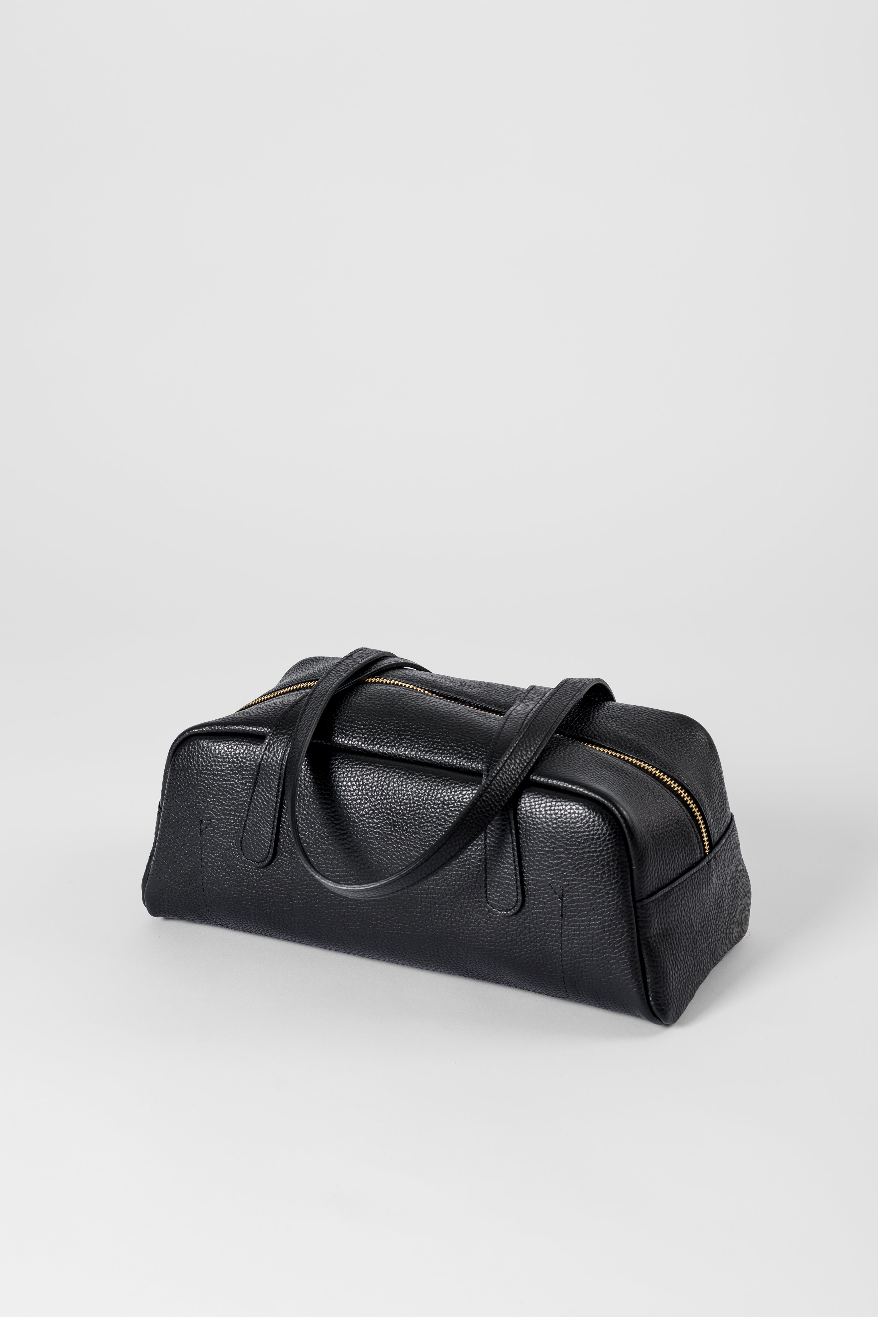 Bowling bag in pelle martellata