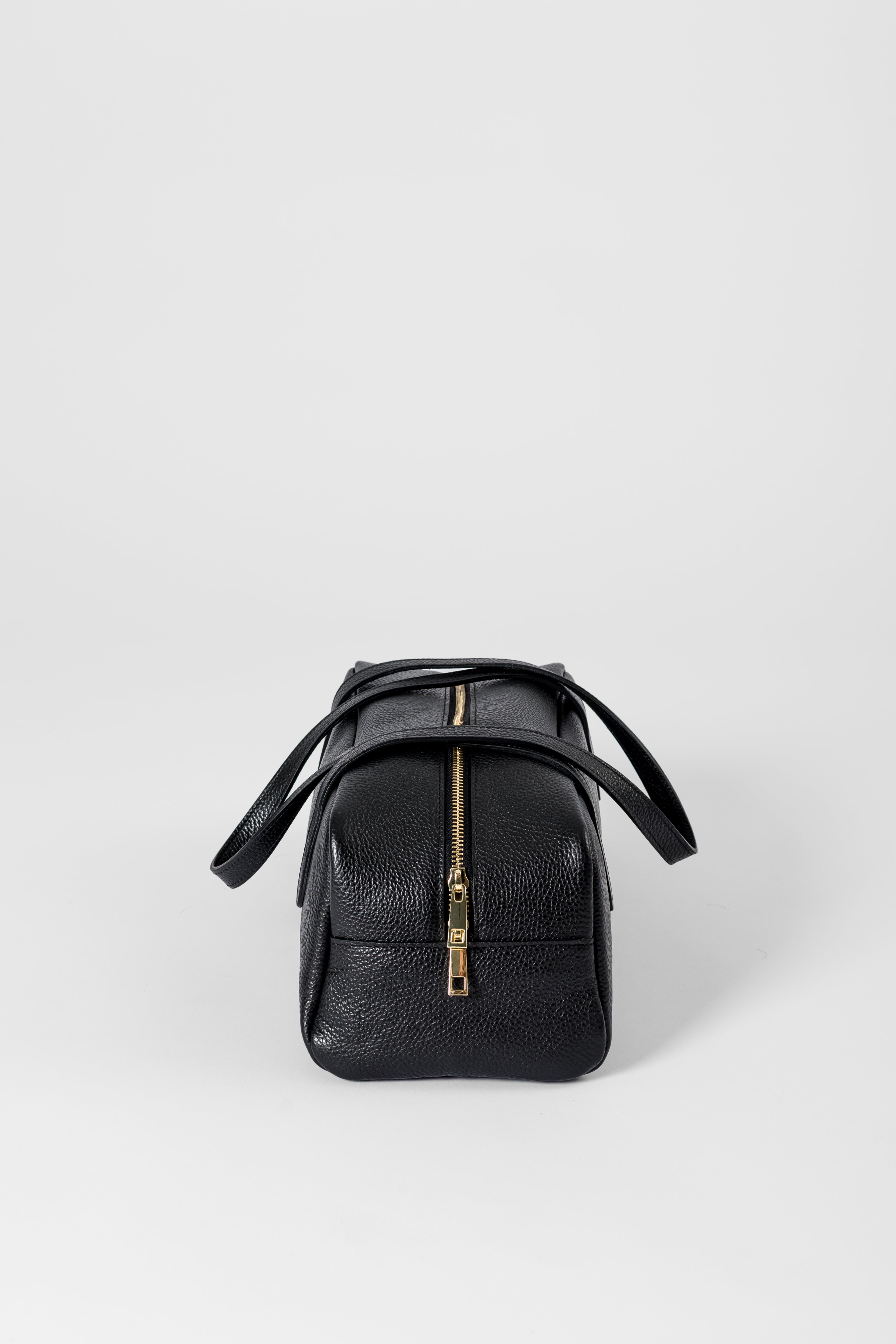 Bowling bag in pelle martellata