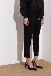 Pantalone con coulisse in fluido diagonale