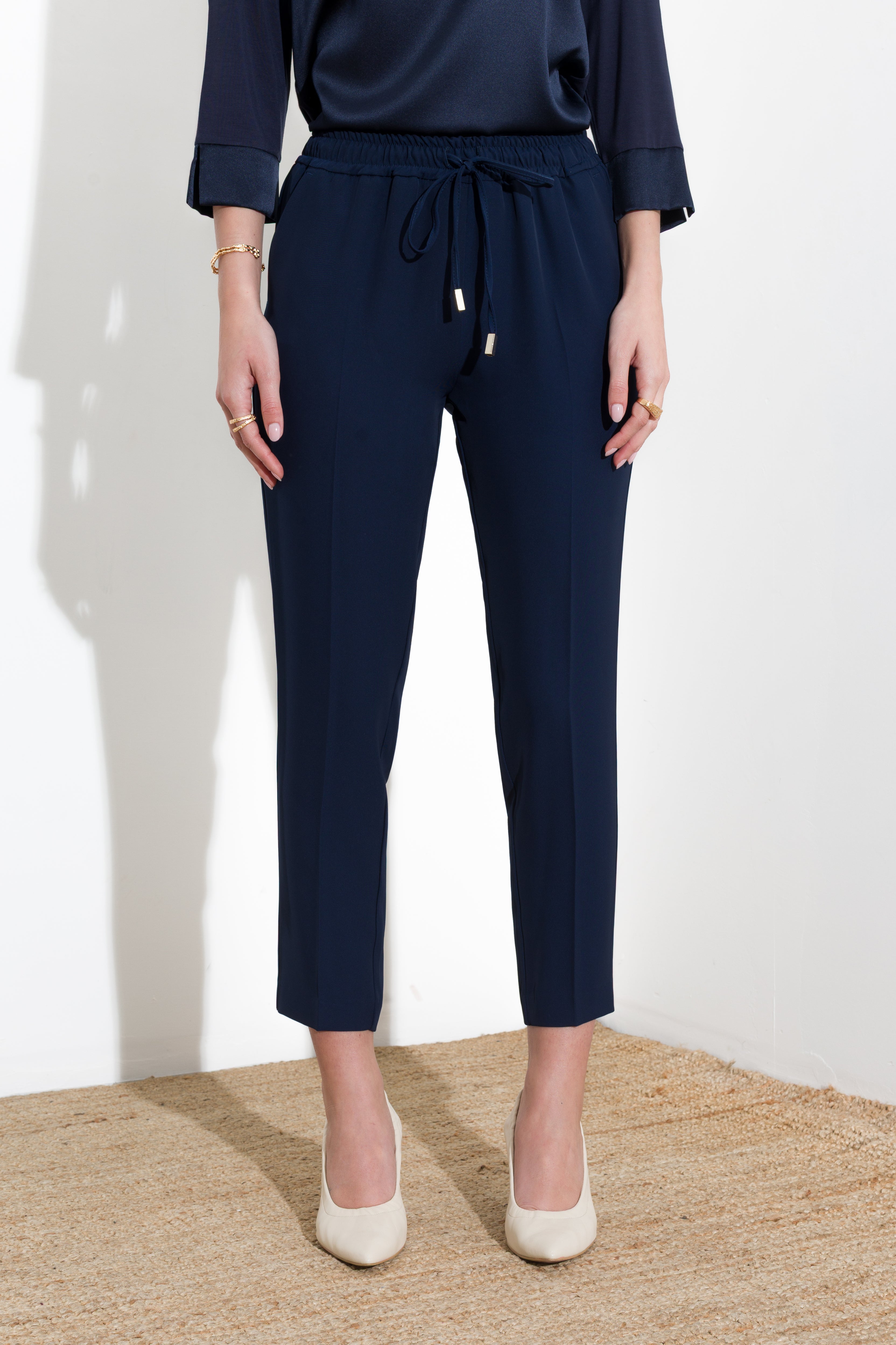 Pantalone con coulisse in fluido diagonale