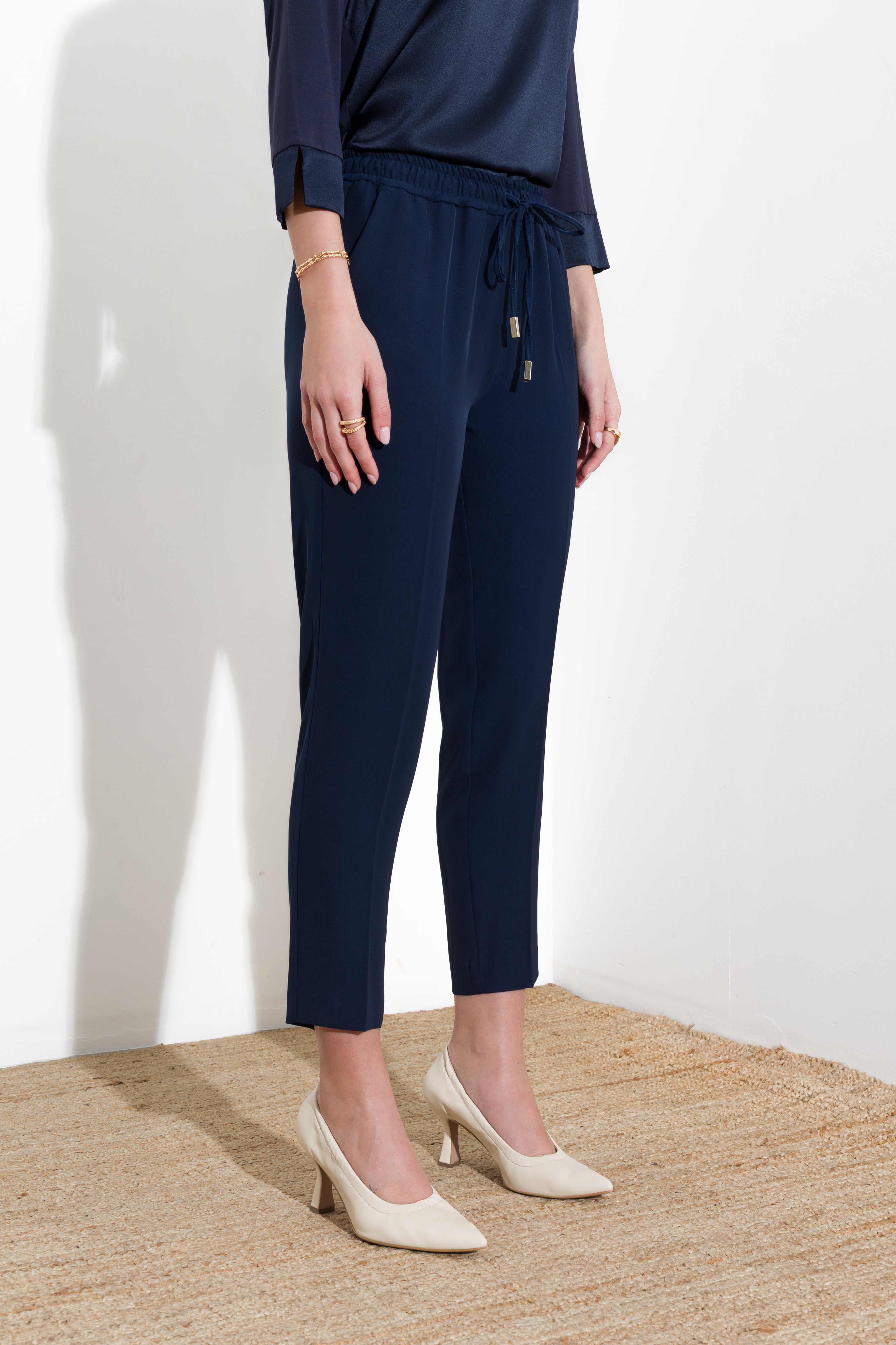 Pantalone con coulisse in fluido diagonale