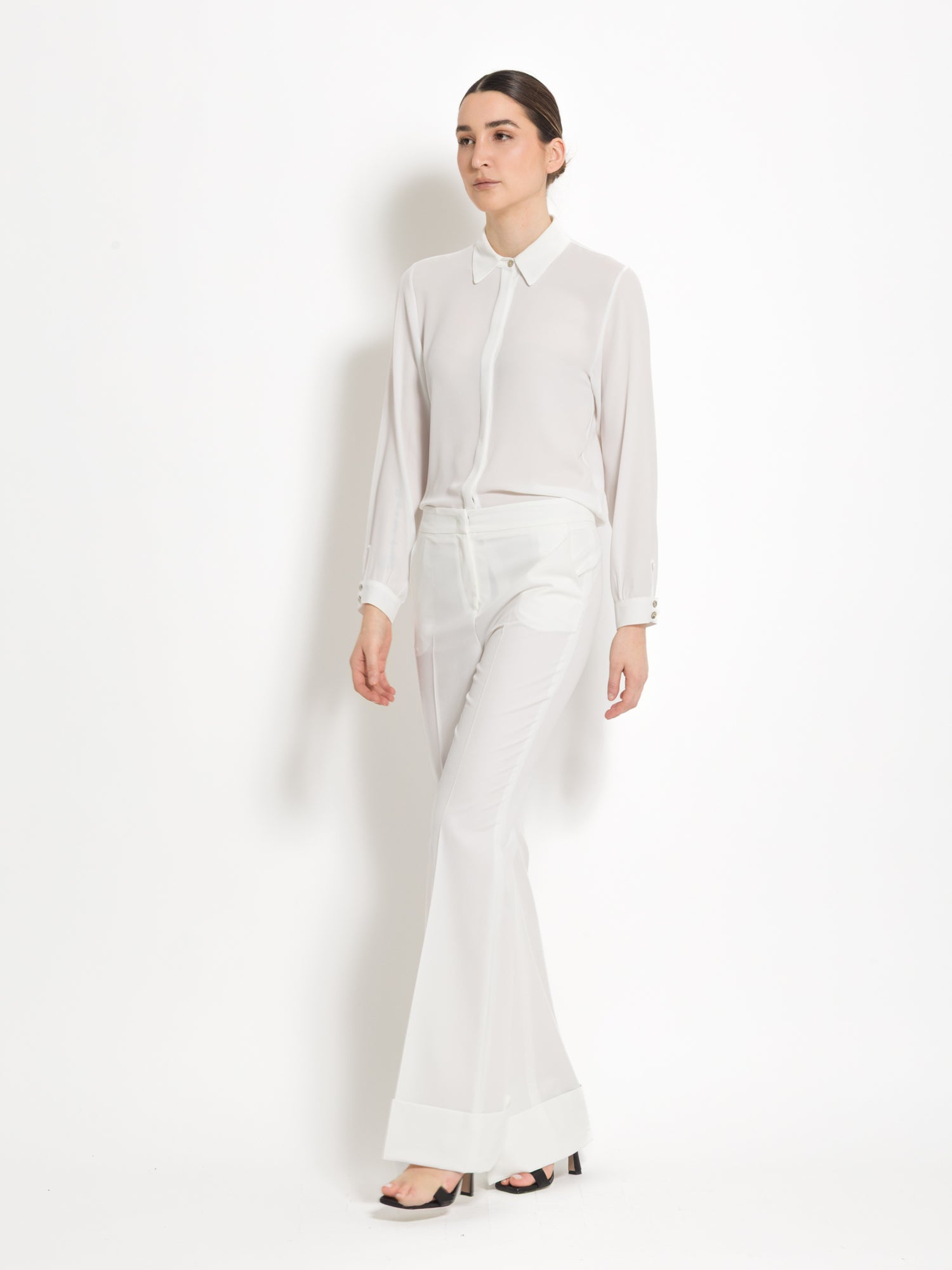 Pantalone flare con risvolto