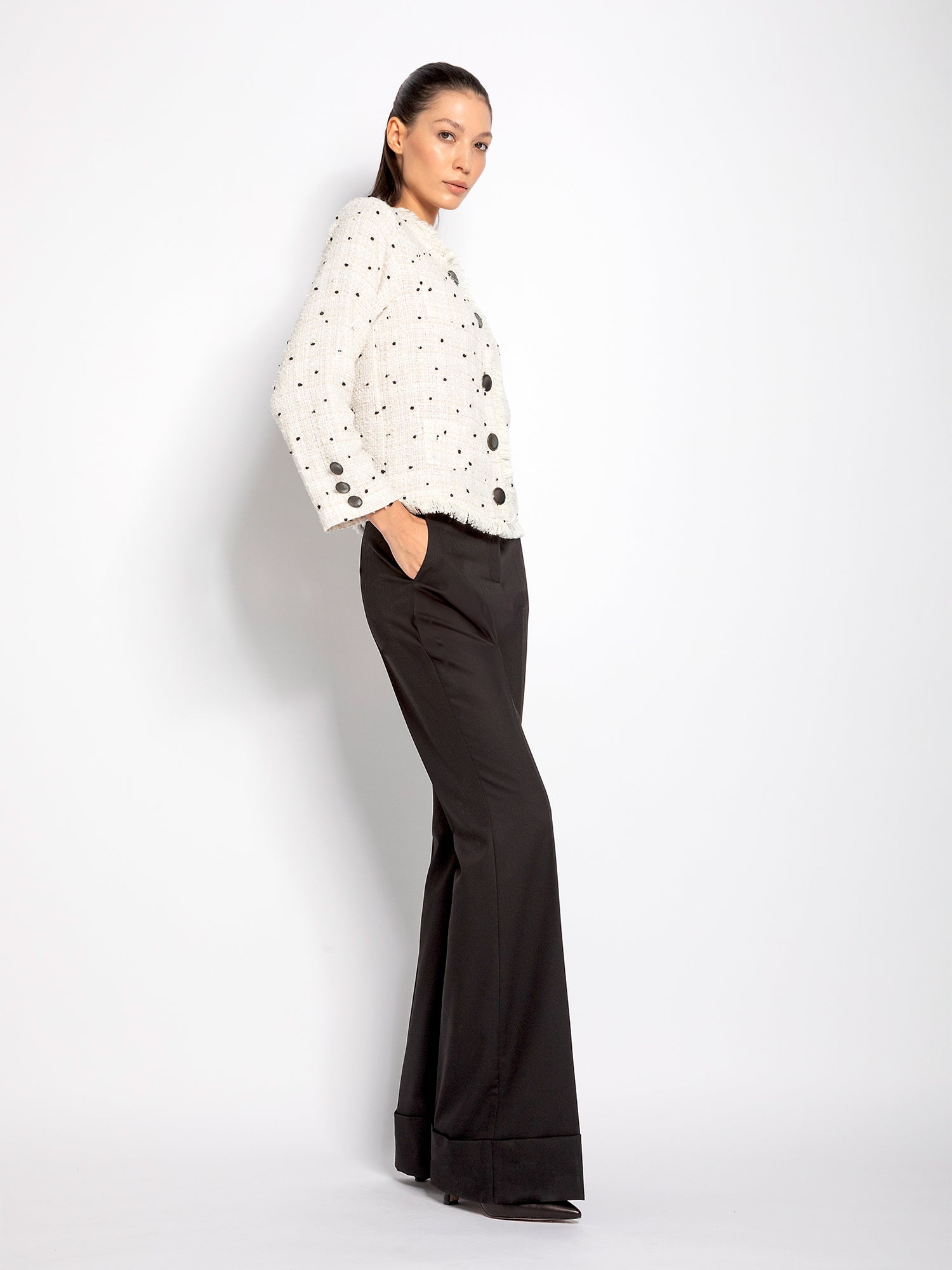 Pantalone flare con risvolto