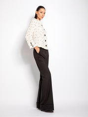 Pantalone flare con risvolto