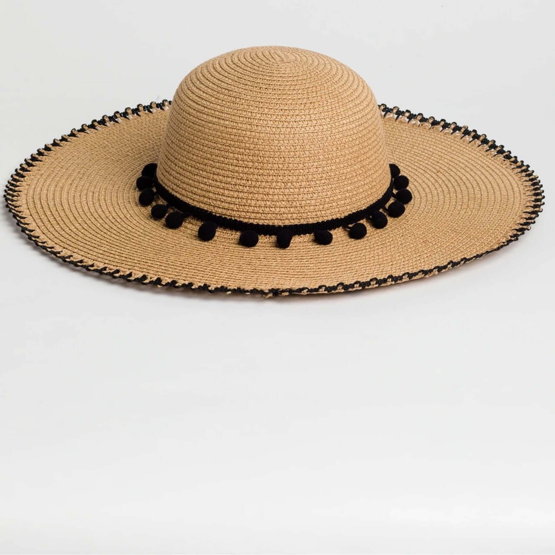 Cappello in paglia con nappine | Uncategorized da donna