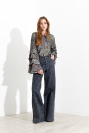Blusa con maniche volant