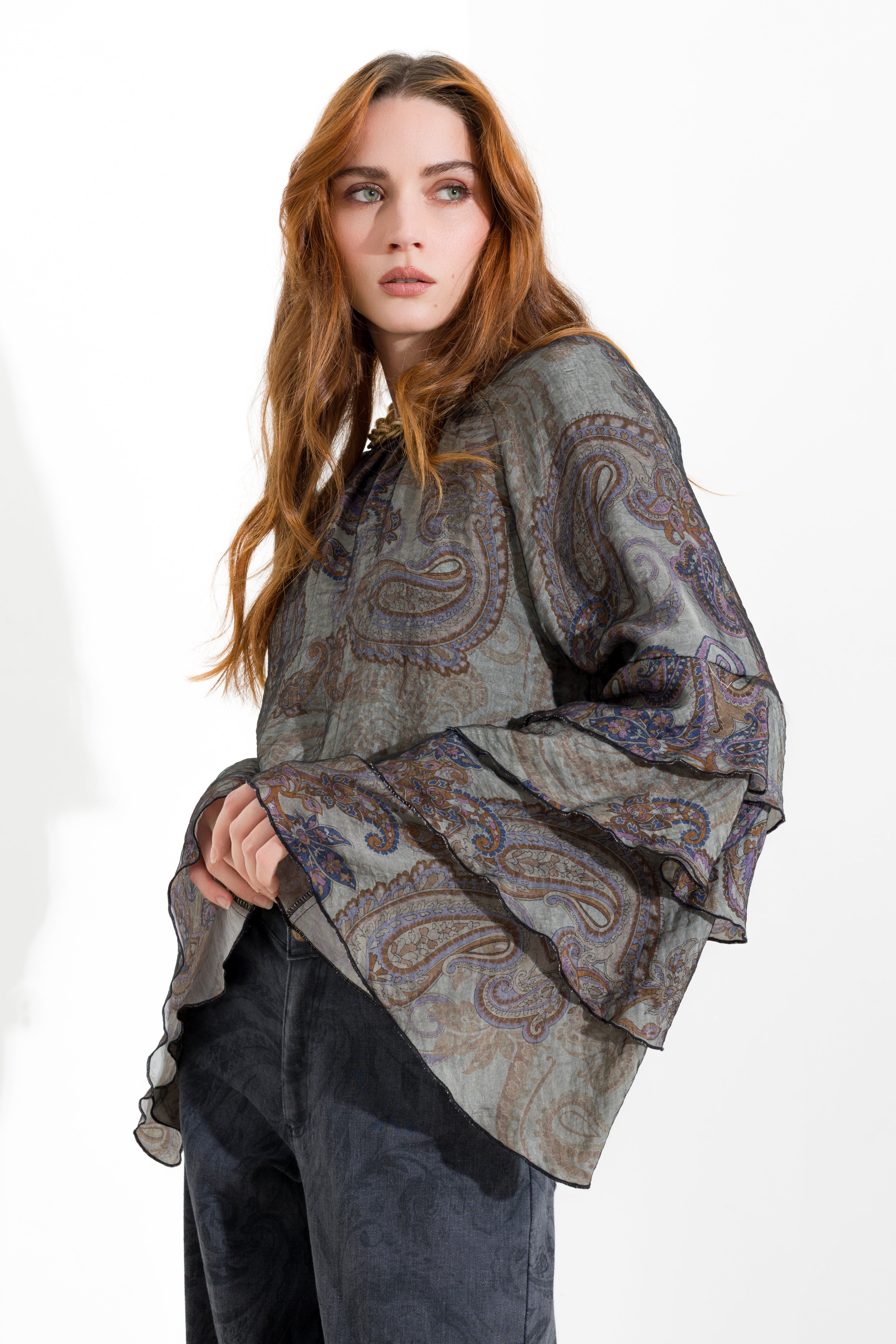 Blusa con maniche volant