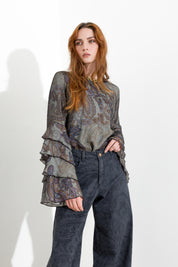 Blusa con maniche volant