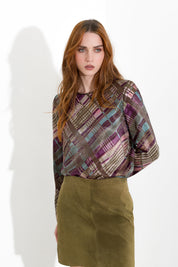Blusa con spacchi laterali