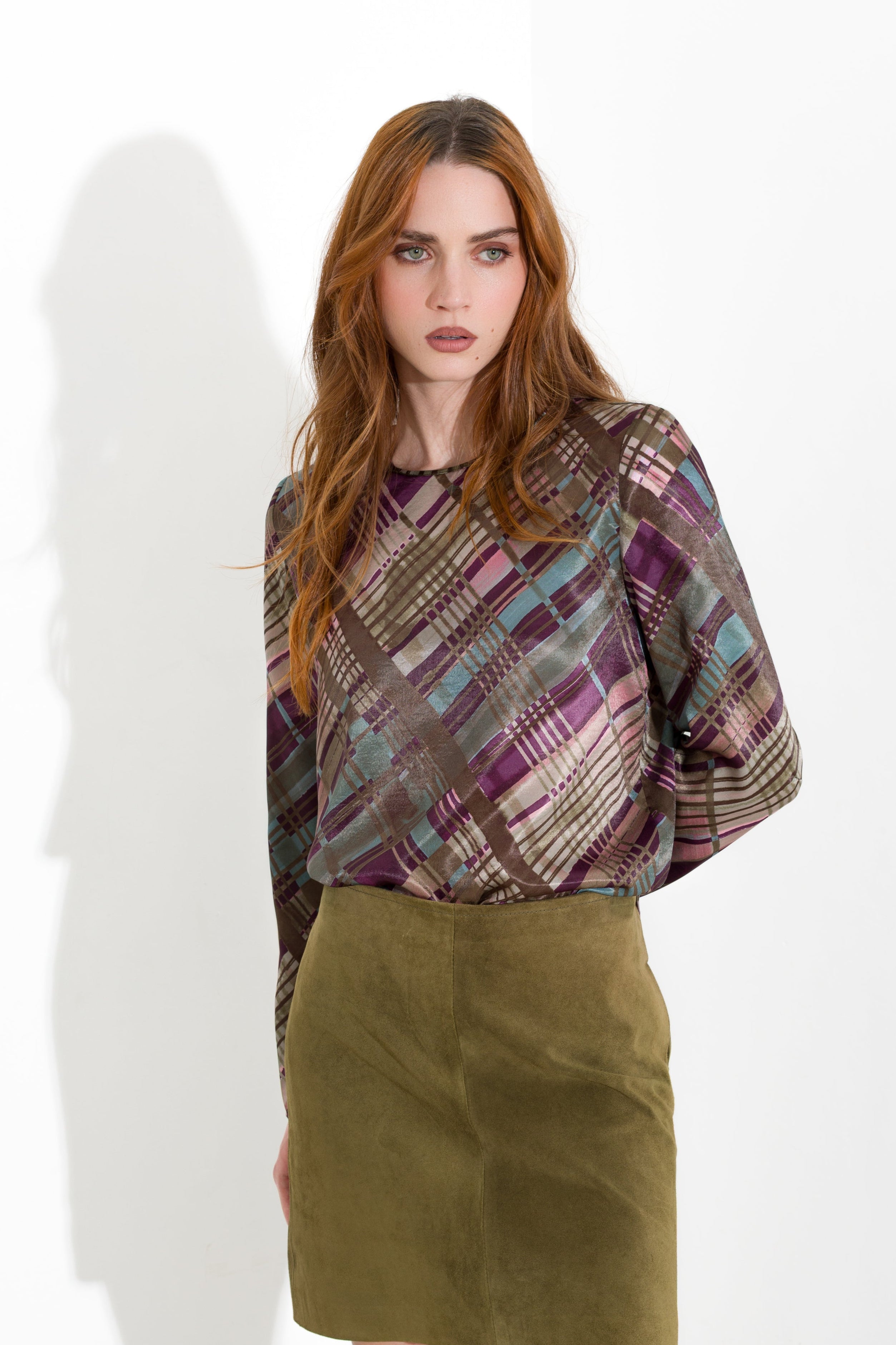 Blusa con spacchi laterali