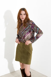 Blusa con spacchi laterali