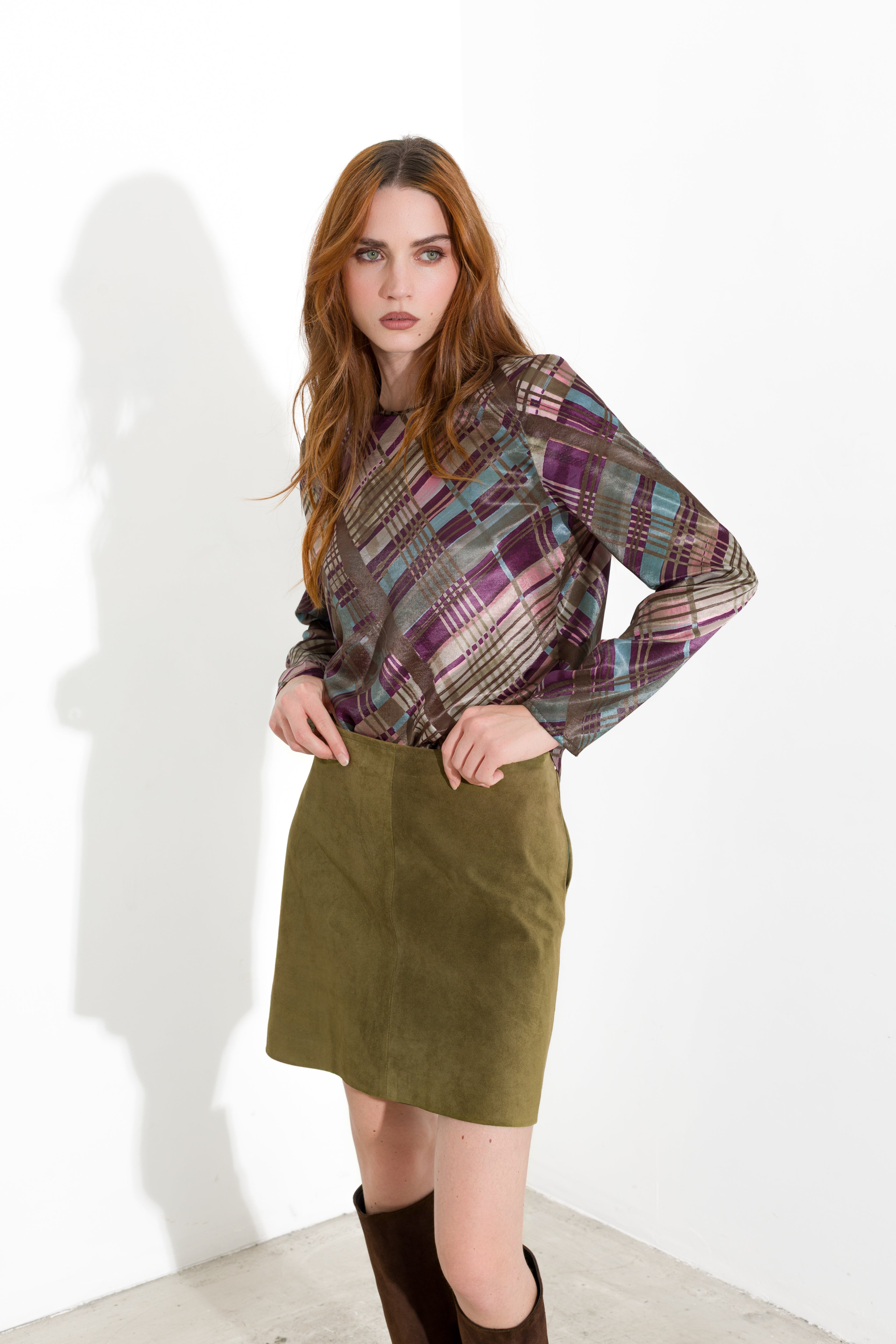 Blusa con spacchi laterali