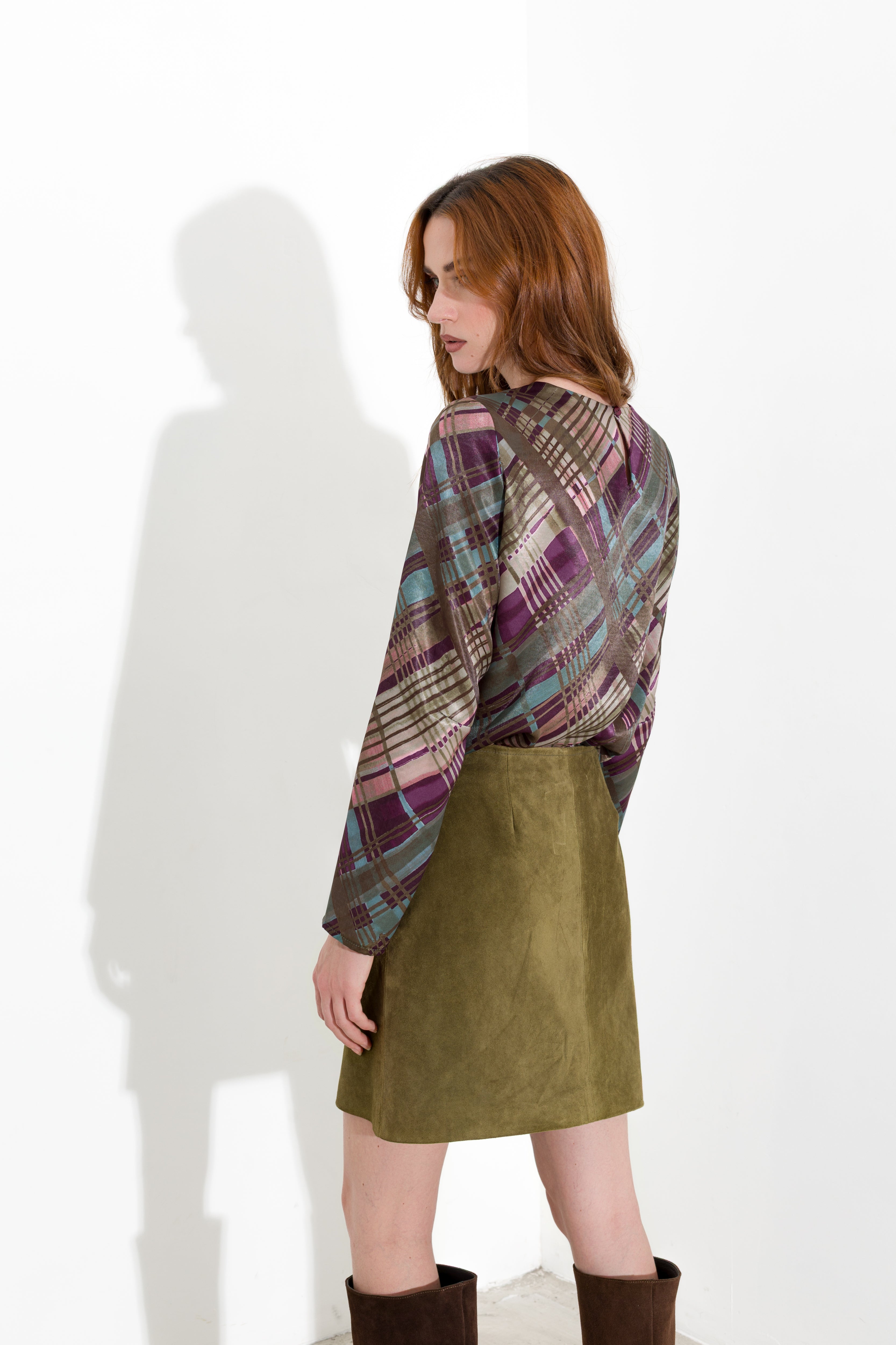 Blusa con spacchi laterali