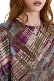Blusa con spacchi laterali