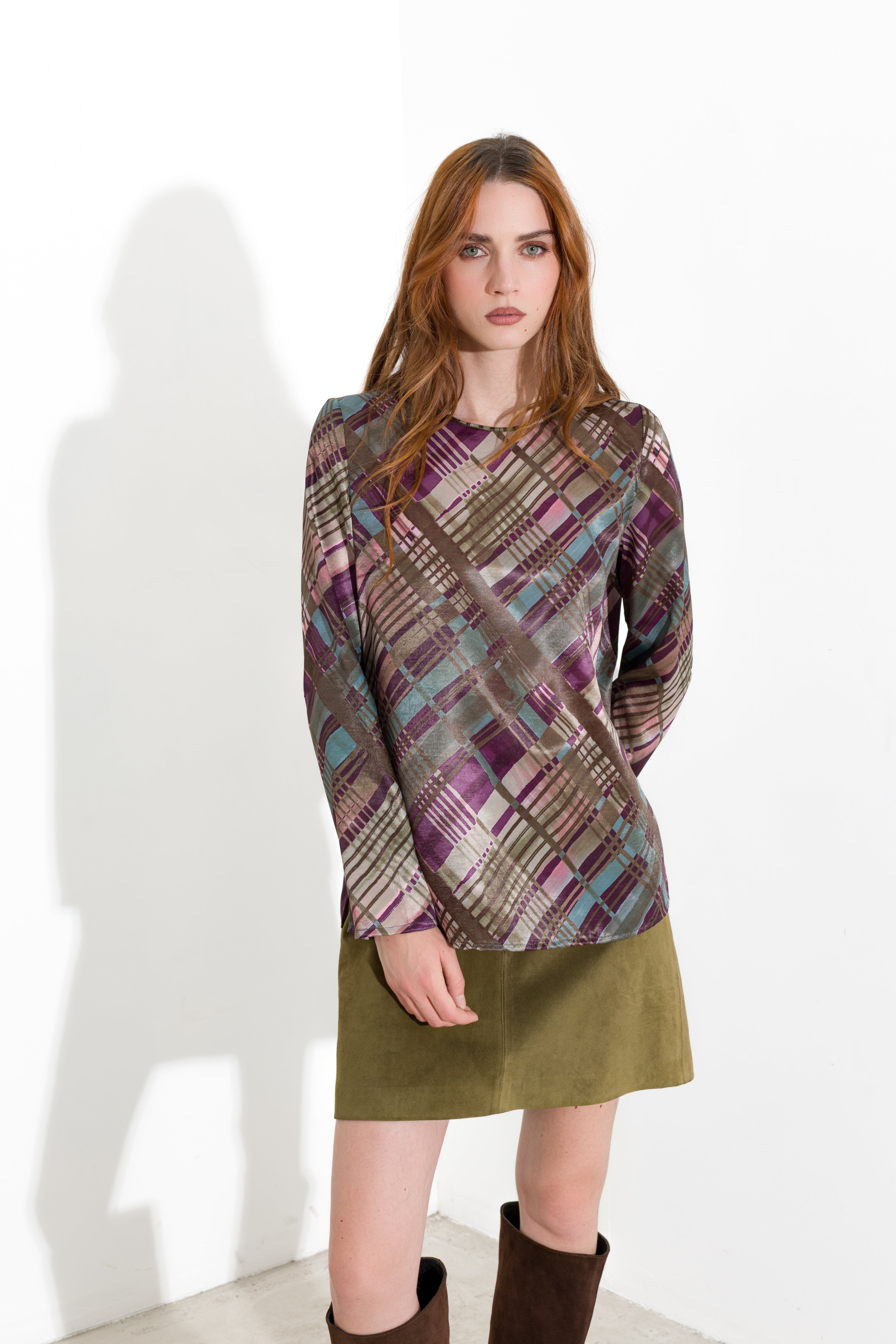 Blusa con spacchi laterali