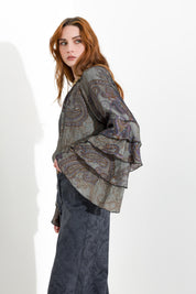 Blusa con maniche volant