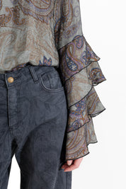Blusa con maniche volant