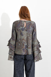 Blusa con maniche volant