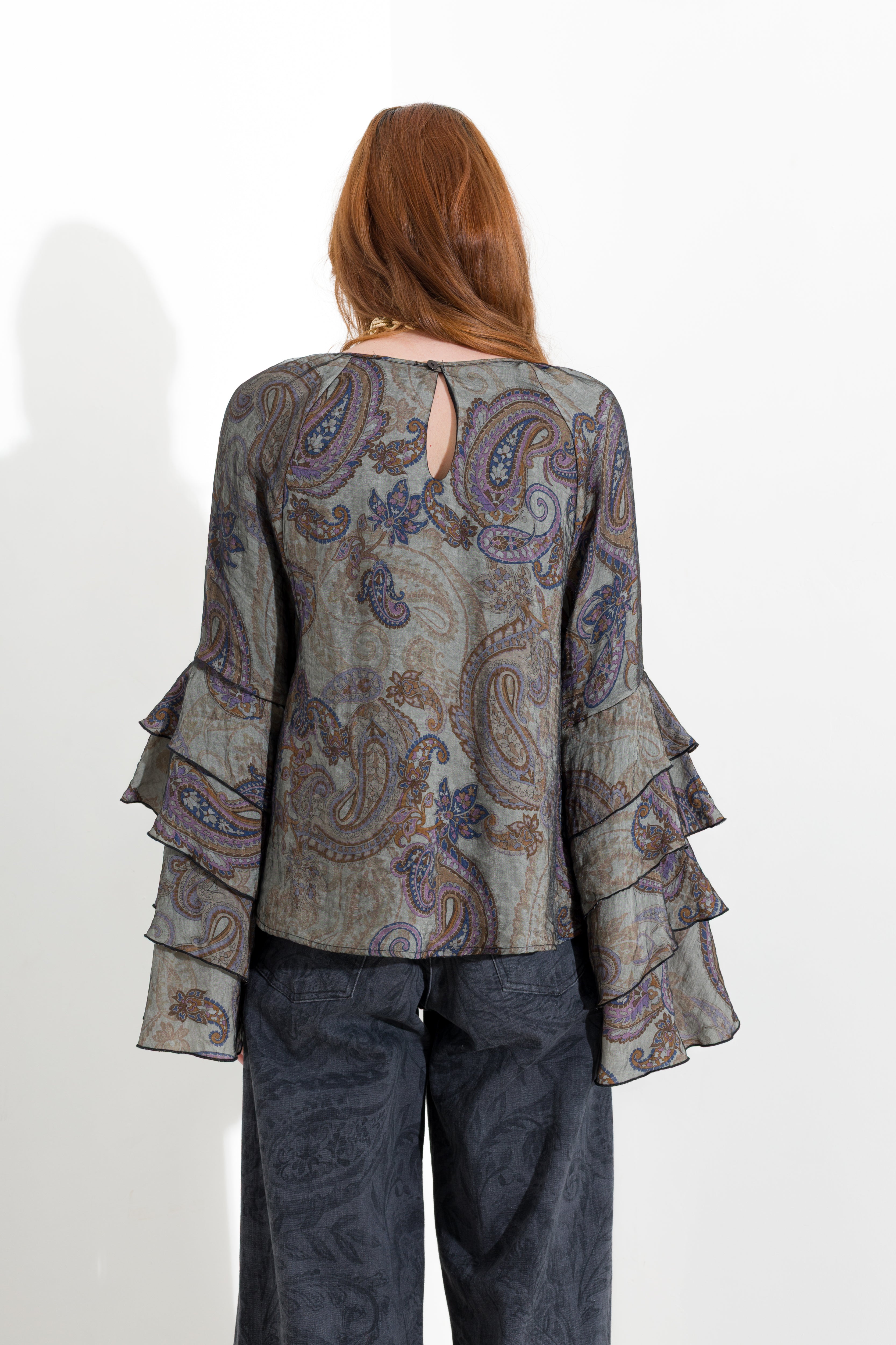 Blusa con maniche volant