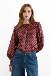 Blusa stampata con polsini arricciati