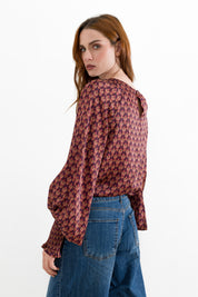Blusa stampata con polsini arricciati