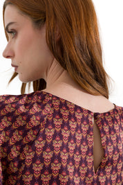 Blusa stampata con polsini arricciati