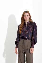 Blusa con scollo a goccia