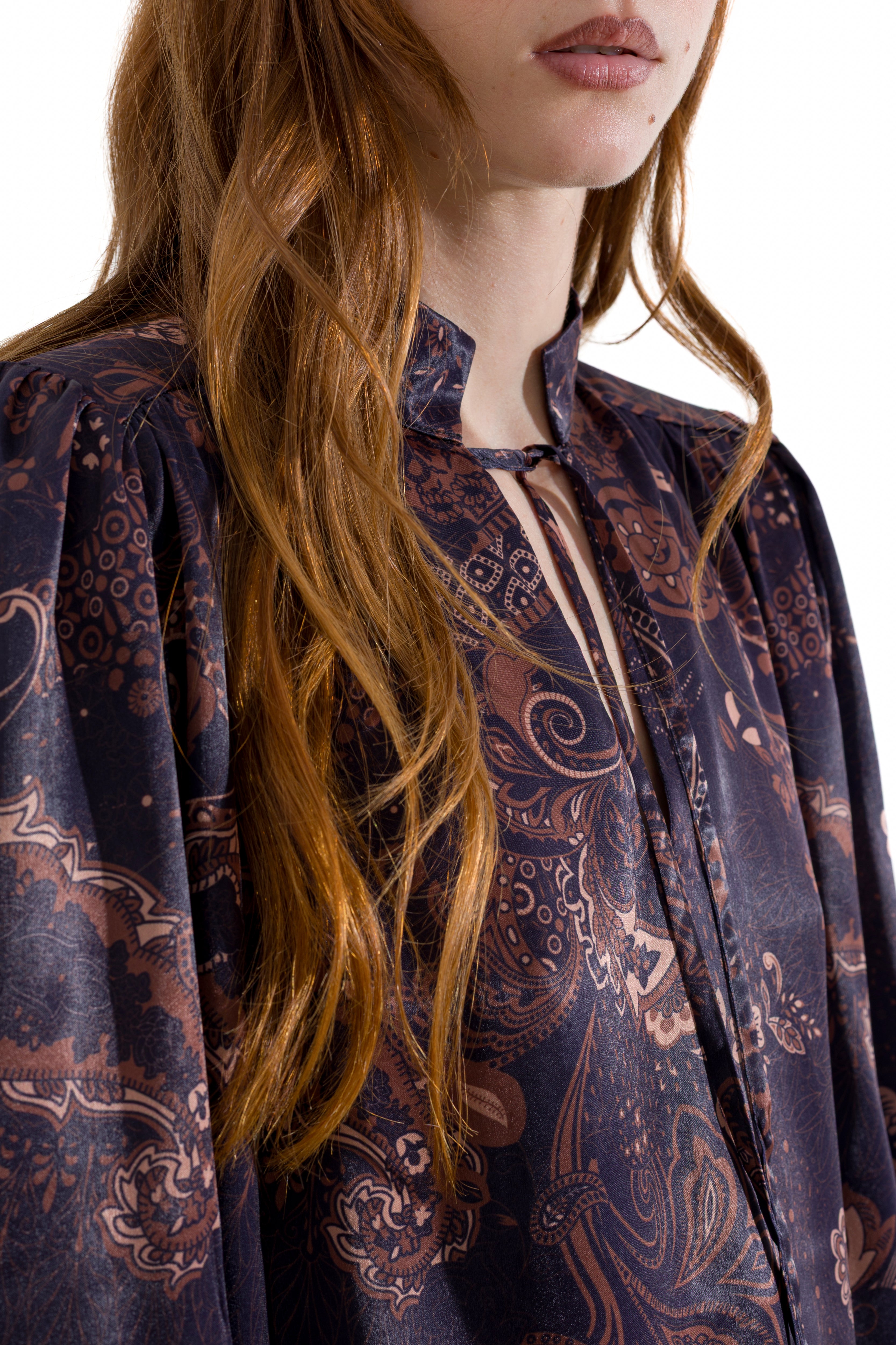 Blusa con scollo a goccia