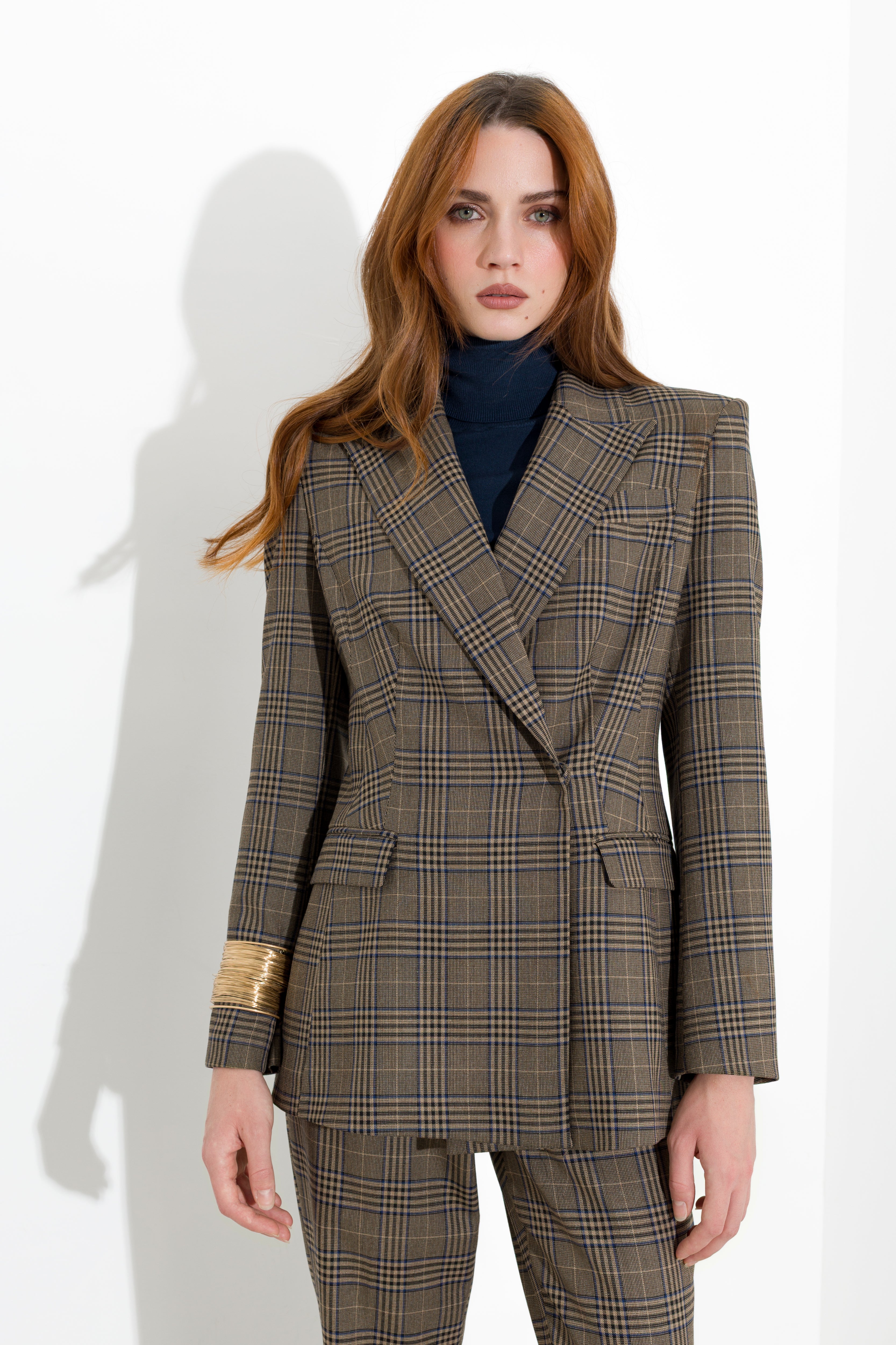 Blazer a quadri con rever a lancia