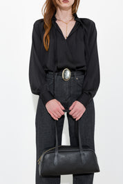 Bowling bag in pelle martellata