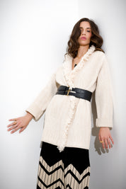 Cappotto tramato con frange