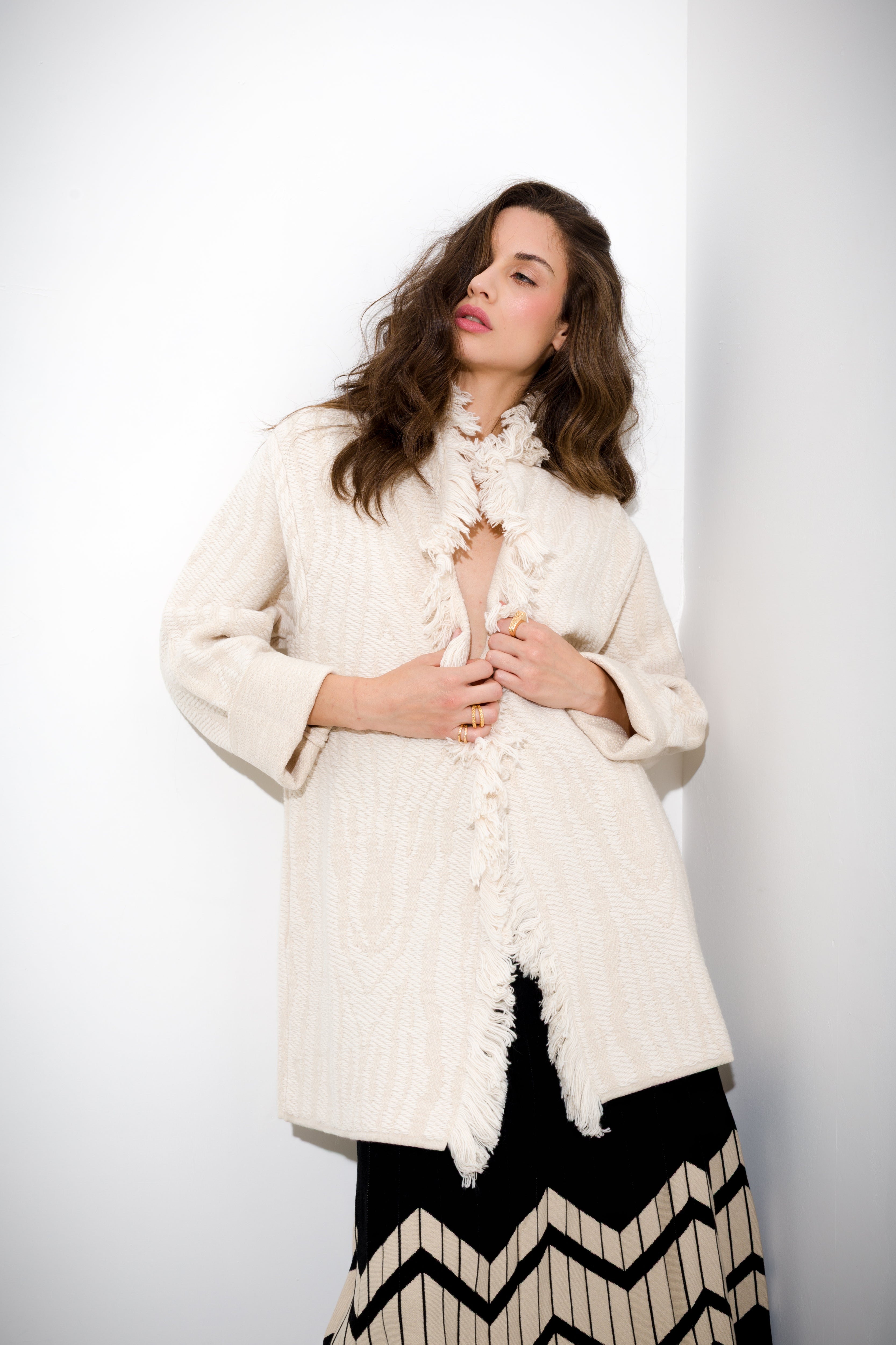 Cappotto tramato con frange