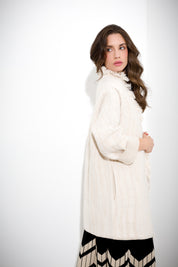 Cappotto tramato con frange