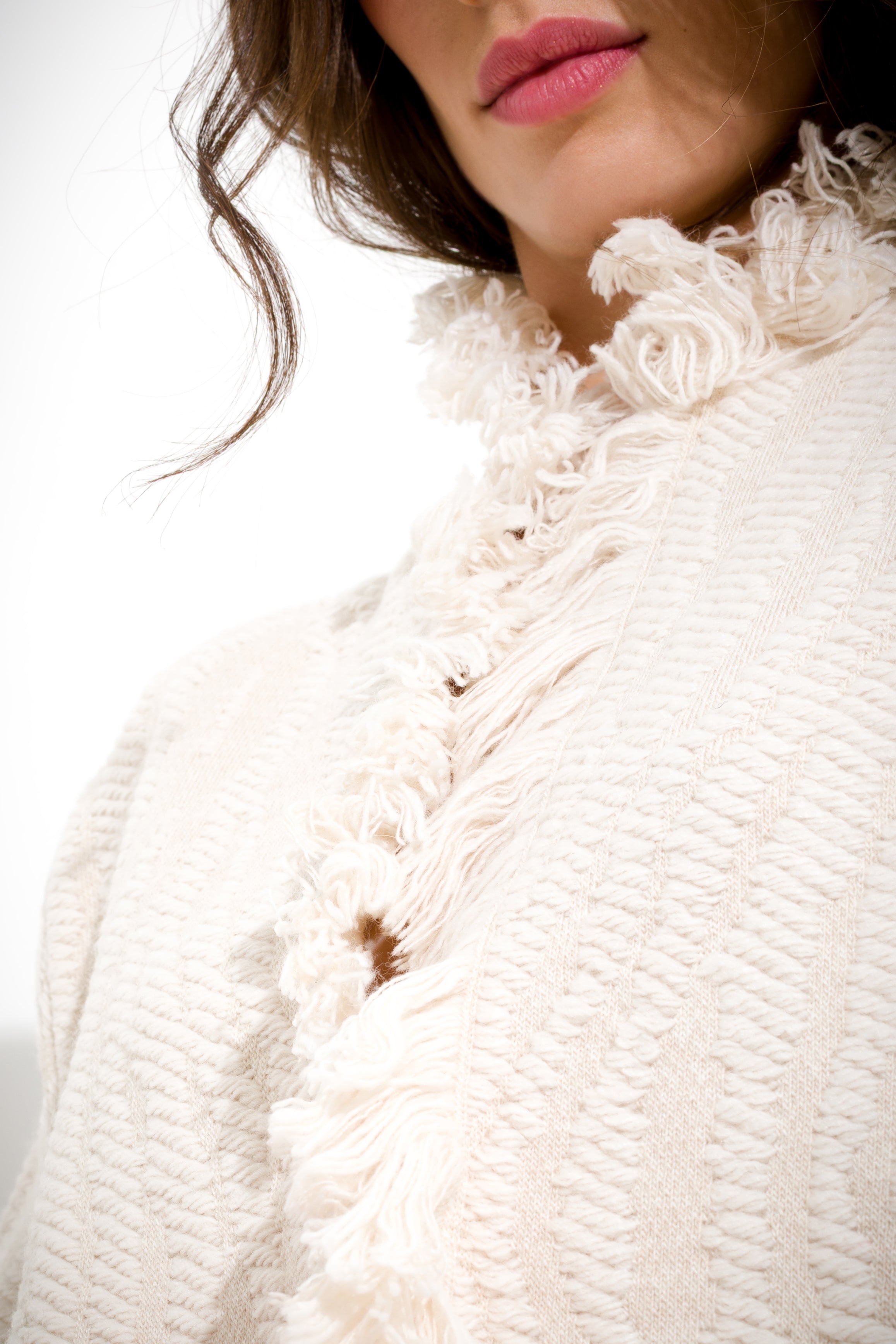 Cappotto tramato con frange
