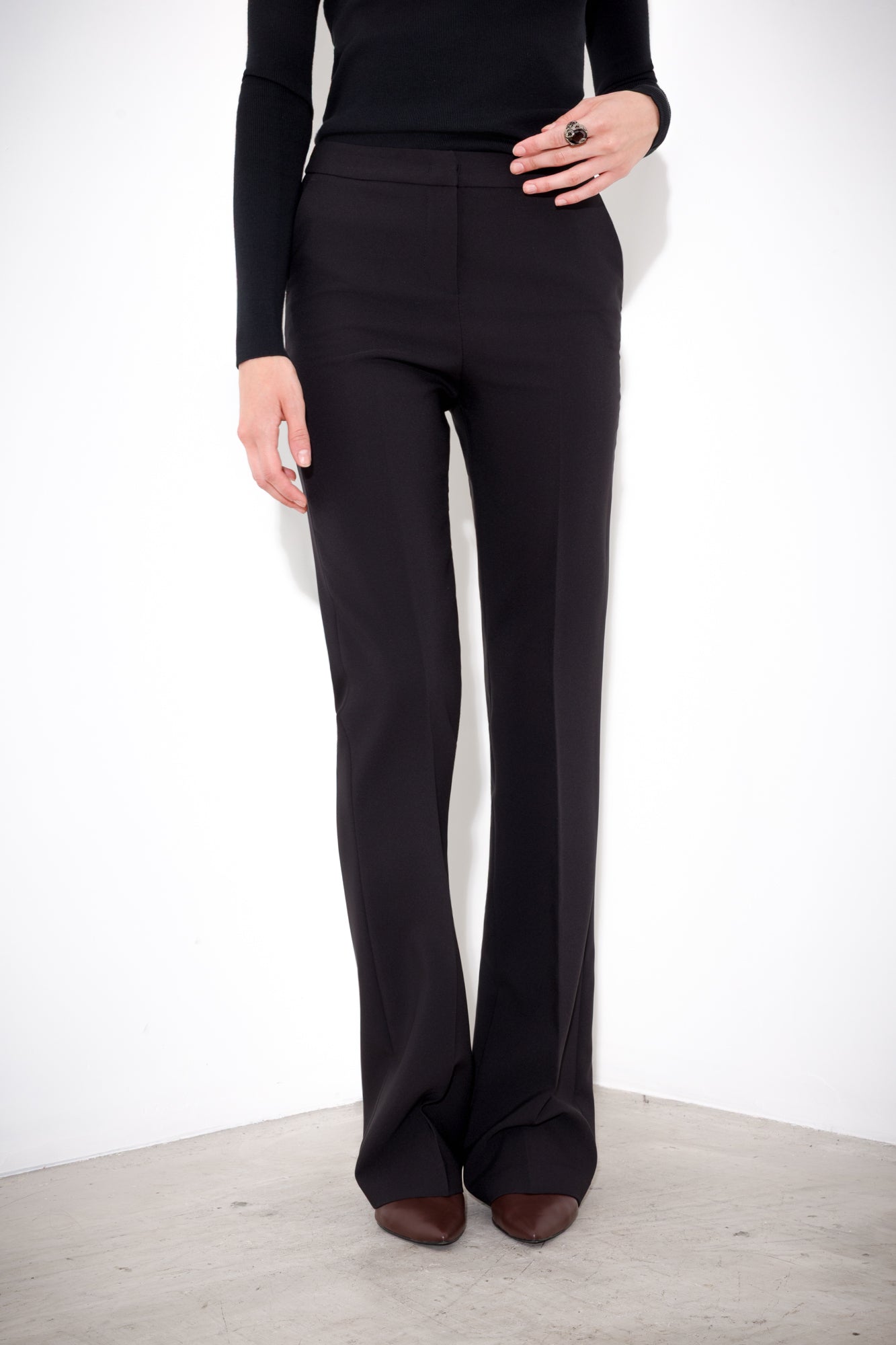Technical flared trousers