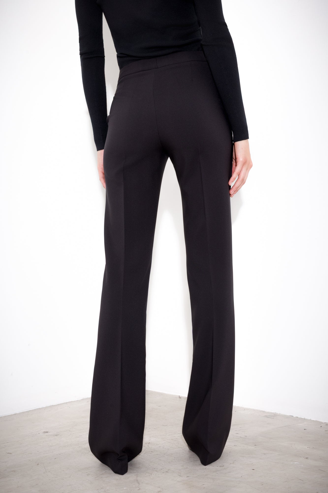 Technical flared trousers
