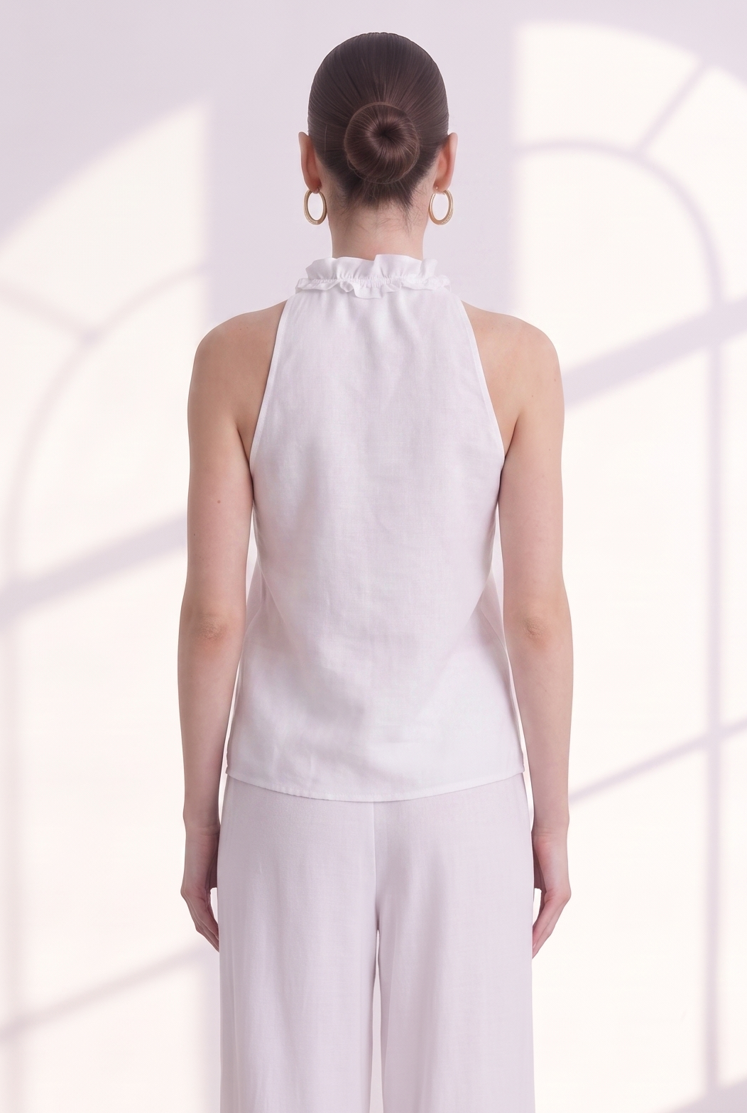 Top con scollo volants