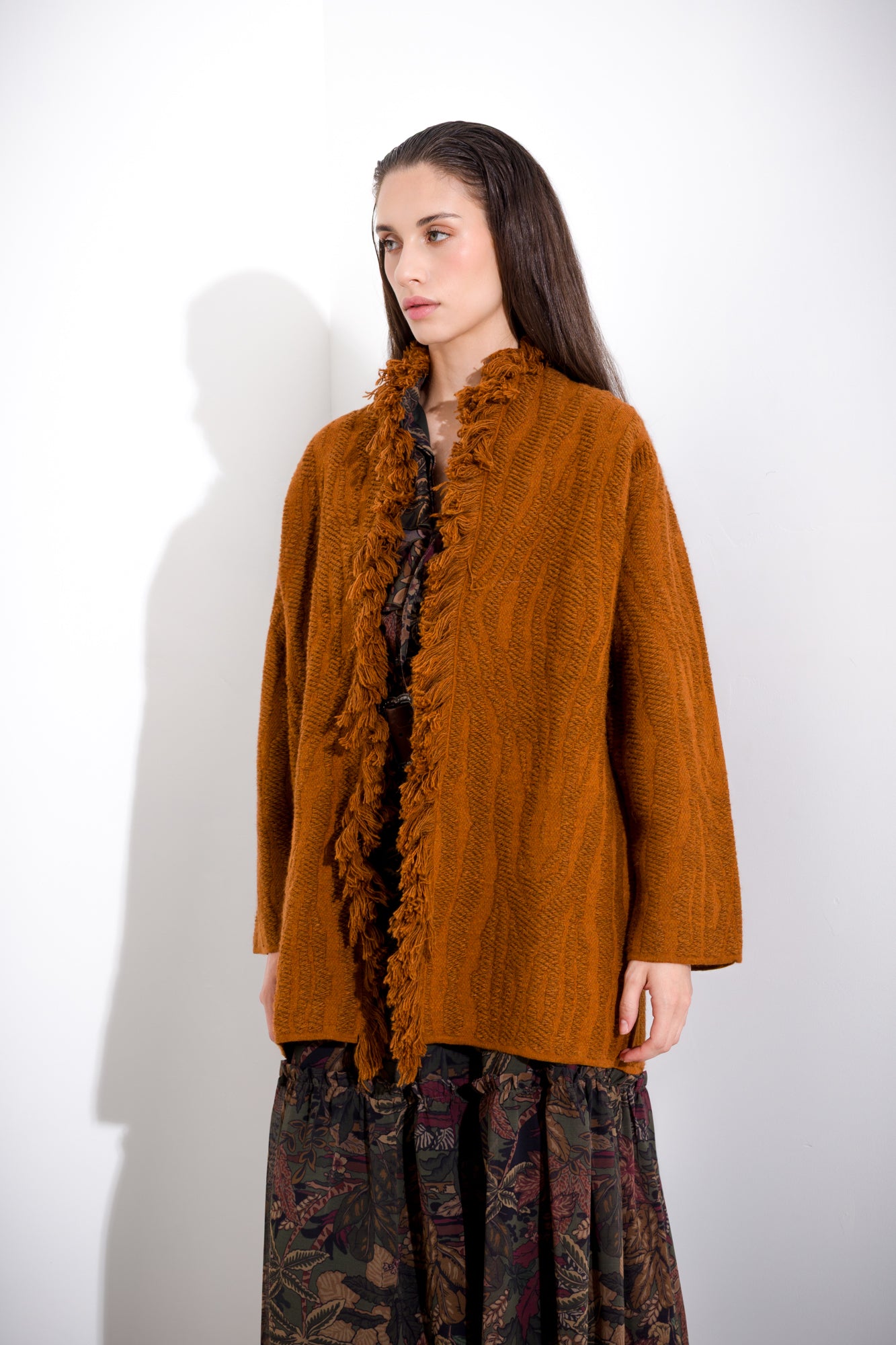 Woven coat with fringes