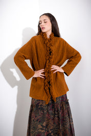Woven coat with fringes