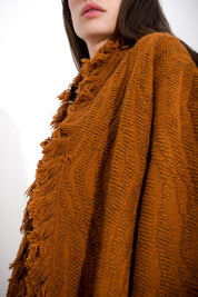 Woven coat with fringes