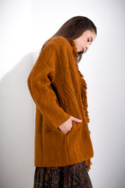 Woven coat with fringes