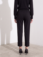 Pantalone slim con risvolto alto