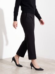 Pantalone slim con risvolto alto