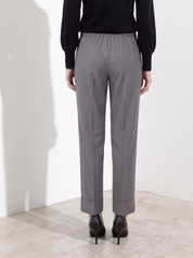 Pantalone slim con risvolto alto