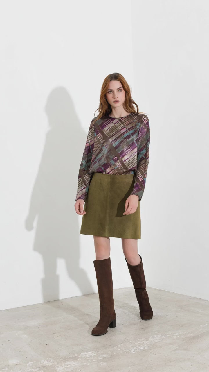 Blusa con spacchi laterali